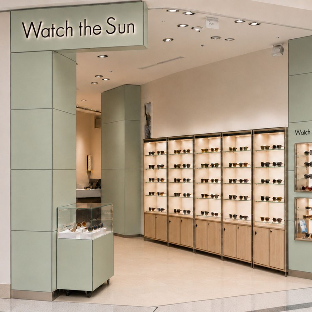 A sunglasses shop with moss green paneling joined with Stickman linear butt joins and external corner joins in dark green